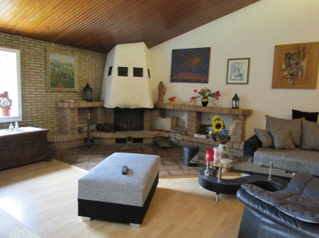 Wohnzimmer mit Kamin Einfamilienhaus Lohmar / Neuhonrath