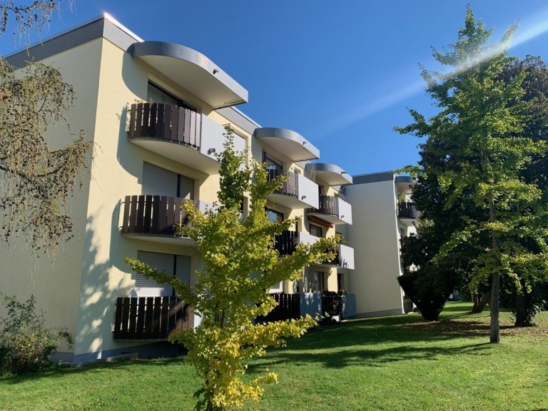 R�ckansicht Sankt Augustin Erdgeschosswohnung SANKT AUGUSTIN NIEDERBEG, helle 3-Zi ETW ca. 88 m� Wfl. K�., Diele, Bad, GWC, Balkon, Keller, Garage