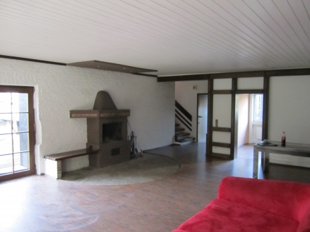 Wohnzimmer mit Kamin Mehrfamilienhaus Lohmar