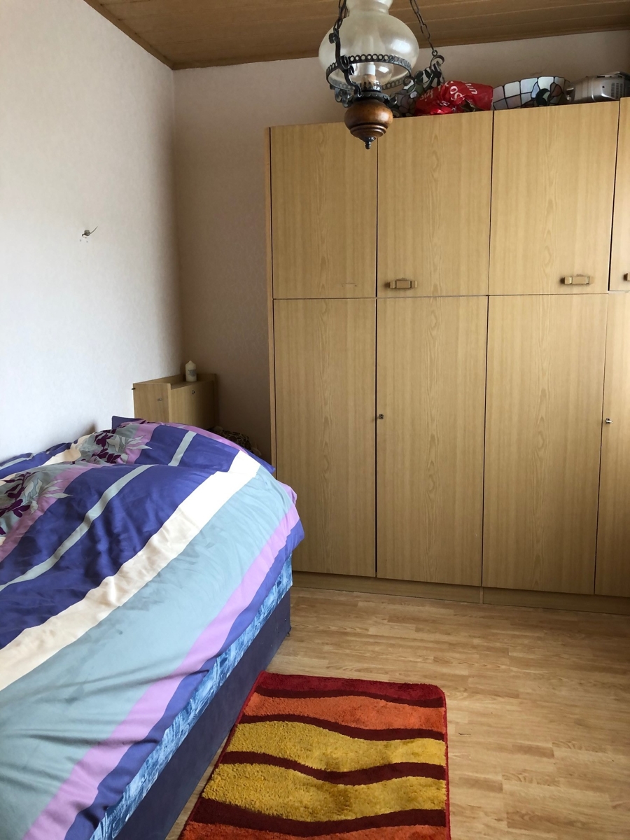 Schlafzimmer in der Einliegerwohnung Einfamilienhaus Hennef (Sieg)