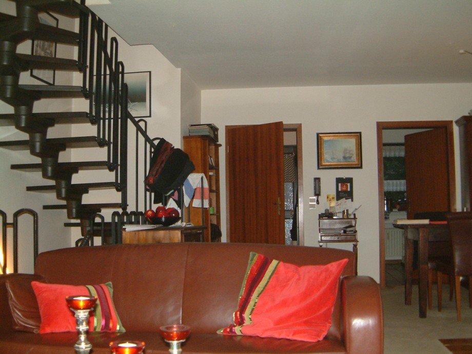 Wohn,- Esszimmer mit Kamin Reiheneckhaus Sankt Augustin