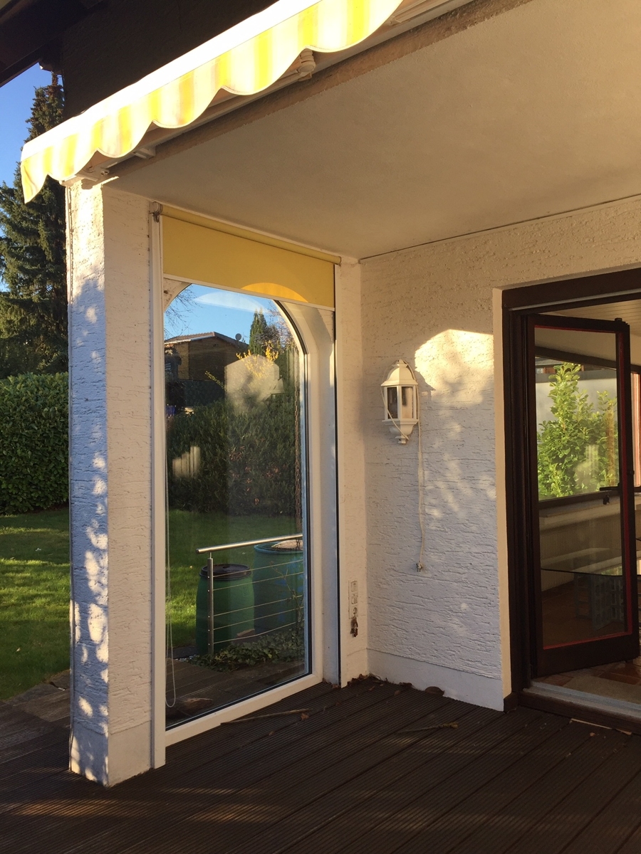 Ansicht Terrasse mit Markise Einfamilienhaus Much / Marienfeld